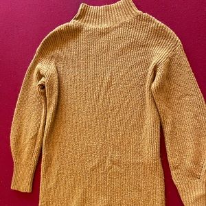 orange sweater, gently used.